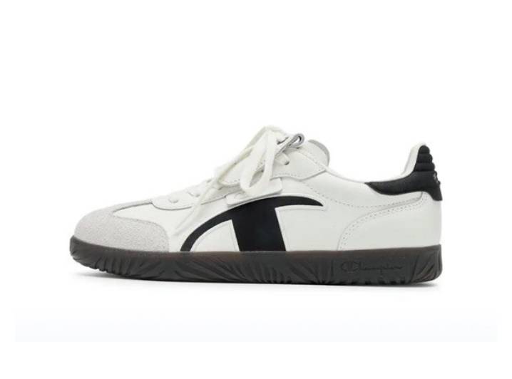 Women's Champion Champ T-trainer sneakers—German-designed, retro-style with a T-toe, featuring a classic logo and a detachable tongue.
